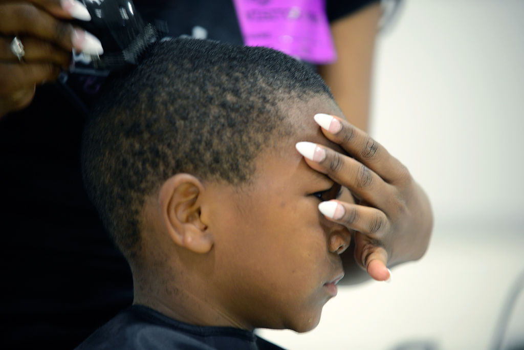 Nehemiah Briggs gets a haircut